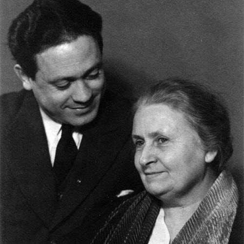 Dr. Maria Montessori at her desk